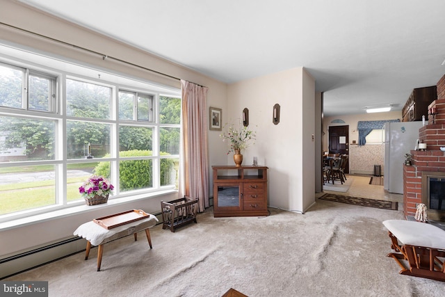 25 Kollman Dr, Newark, DE 19713 - carpeted living room with arched walkways, a fireplace, and a baseboard radiator