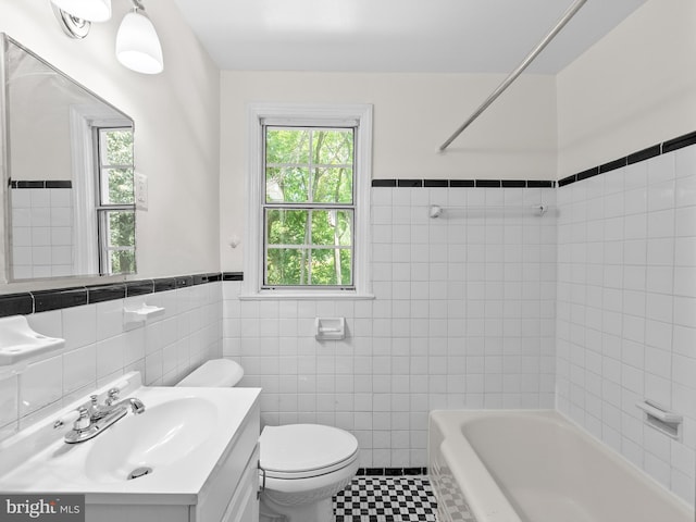 6727 W Wakefield Dr Unit A2, Alexandria, VA 22307 - full bath with tile walls, vanity, toilet, wainscoting, and tile patterned flooring