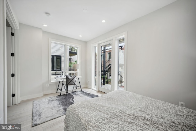 1744 Lanier Pl NW Unit 1, Washington, DC 20009 - bedroom featuring wood finished floors, access to exterior, recessed lighting, and baseboards