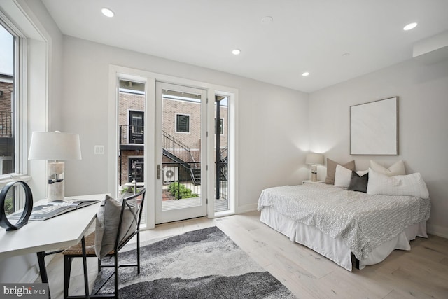 1744 Lanier Pl NW Unit 1, Washington, DC 20009 - bedroom featuring access to exterior, light wood-type flooring, baseboards, and recessed lighting