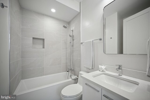 1744 Lanier Pl NW Unit 1, Washington, DC 20009 - bathroom with toilet, vanity, tub / shower combination, and recessed lighting