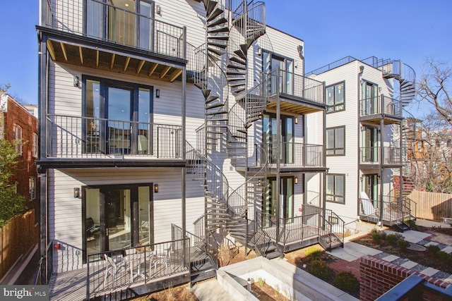 1744 Lanier Pl NW Unit 1, Washington, DC 20009 - rear view of house with a balcony and stairway
