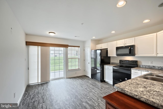 216 Jutland Way Lot 267, Red Lion, PA 17356 - kitchen featuring black appliances, dark wood-type flooring, white cabinetry, and recessed lighting