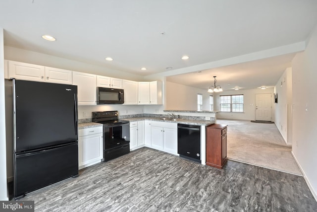 216 Jutland Way Lot 267, Red Lion, PA 17356 - kitchen featuring black appliances, a chandelier, a peninsula, white cabinetry, and recessed lighting