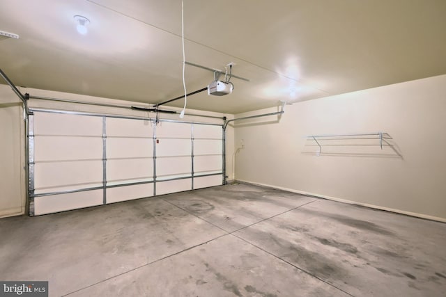 216 Jutland Way Lot 267, Red Lion, PA 17356 - garage featuring a garage door opener and baseboards