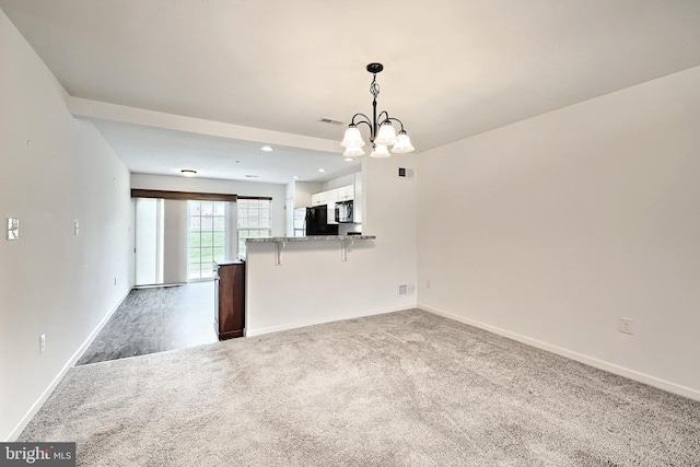 216 Jutland Way Lot 267, Red Lion, PA 17356 - unfurnished living room featuring carpet, a chandelier, and recessed lighting