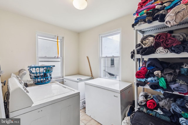 766 S 18th St, Philadelphia, PA 19146 - laundry area with washing machine and clothes dryer, healthy amount of natural light, and light tile patterned floors