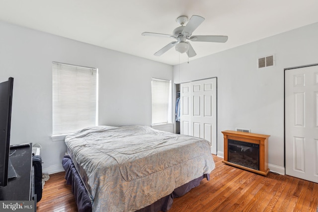766 S 18th St, Philadelphia, PA 19146 - bedroom featuring wood finished floors, baseboards, a closet, and ceiling fan
