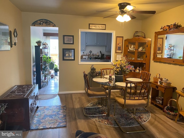 1547 Marlborough Ct, Crofton, MD 21114 - dining room with a ceiling fan, wood finished floors, and baseboards