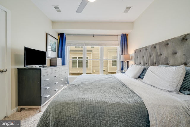 585 Regent Pl NE, Washington, DC 20017 - bedroom featuring light colored carpet, ceiling fan, and baseboards