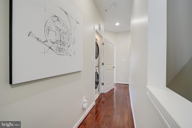 585 Regent Pl NE, Washington, DC 20017 - hall featuring estacked washer and dryer, recessed lighting, dark wood finished floors, and baseboards