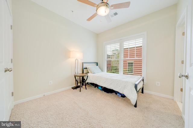 585 Regent Pl NE, Washington, DC 20017 - carpeted bedroom with baseboards and a ceiling fan