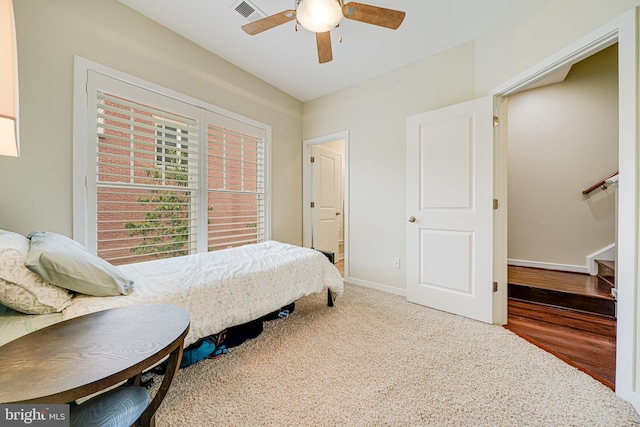 585 Regent Pl NE, Washington, DC 20017 - carpeted bedroom with baseboards and ceiling fan