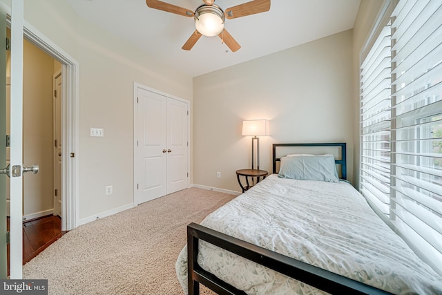 585 Regent Pl NE, Washington, DC 20017 - bedroom with baseboards, carpet floors, a closet, and a ceiling fan