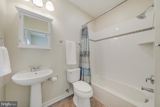 585 Regent Pl NE, Washington, DC 20017 - full bath featuring shower / tub combo with curtain, toilet, tile patterned flooring, and baseboards