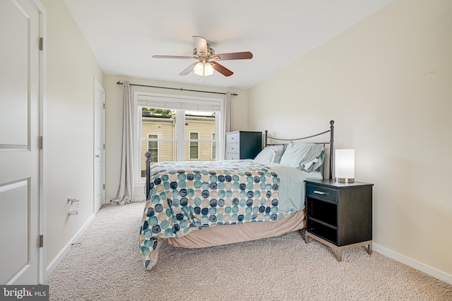 585 Regent Pl NE, Washington, DC 20017 - bedroom featuring light carpet, baseboards, and ceiling fan