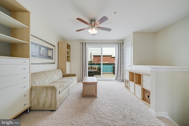 585 Regent Pl NE, Washington, DC 20017 - living area featuring a ceiling fan and carpet flooring