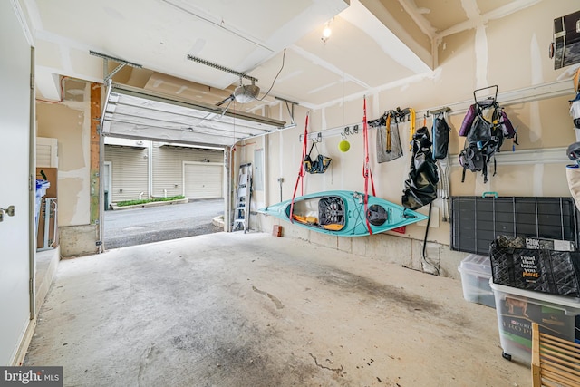 585 Regent Pl NE, Washington, DC 20017 - garage featuring a garage door opener