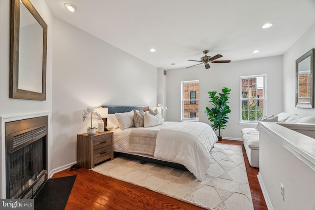 314 Monroe St, Philadelphia, PA 19147 - bedroom featuring a fireplace, wood finished floors, recessed lighting, baseboards, and a ceiling fan