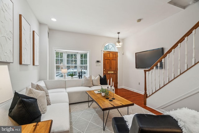 314 Monroe St, Philadelphia, PA 19147 - living room with stairs, wood finished floors, recessed lighting, and baseboards