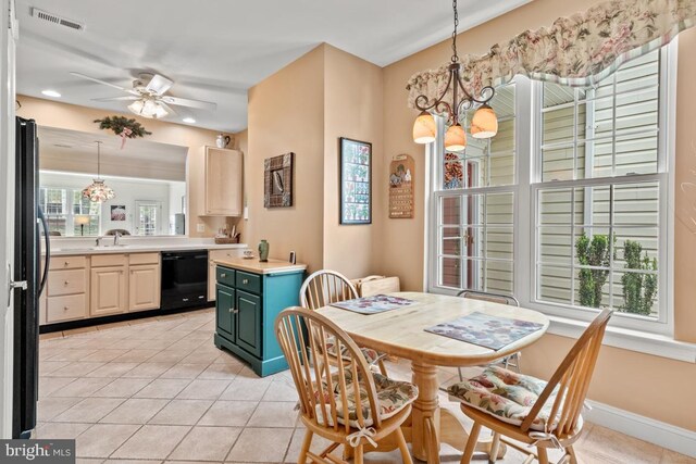 142 Wyndham Woods Way, Hatfield, PA 19440 - dining area featuring a chandelier, light tile patterned floors, ceiling fan, and plenty of natural light