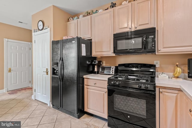 142 Wyndham Woods Way, Hatfield, PA 19440 - kitchen with black appliances, light tile patterned flooring, and light countertops