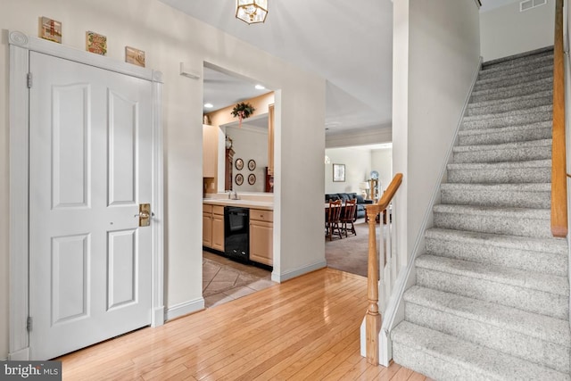 142 Wyndham Woods Way, Hatfield, PA 19440 - stairs featuring wood-type flooring, baseboards, and recessed lighting