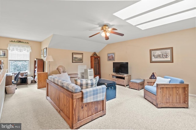 142 Wyndham Woods Way, Hatfield, PA 19440 - living area with carpet flooring, ceiling fan, a skylight, and vaulted ceiling