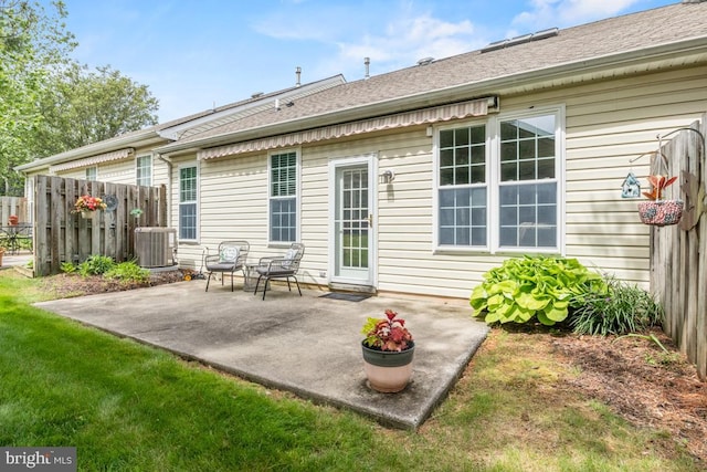 142 Wyndham Woods Way, Hatfield, PA 19440 - back of house featuring a patio area and central AC unit