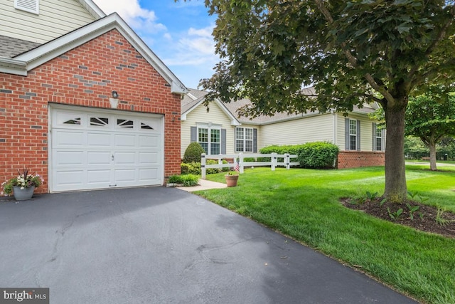 142 Wyndham Woods Way, Hatfield, PA 19440 - view of front of house featuring brick siding, asphalt driveway, and a garage