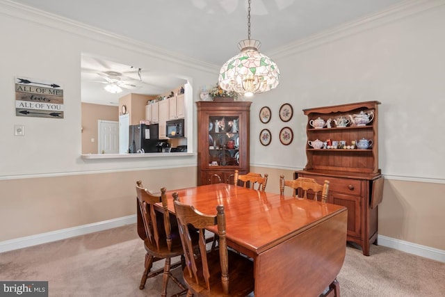 142 Wyndham Woods Way, Hatfield, PA 19440 - dining room with light carpet, baseboards, a chandelier, ornamental molding, and a ceiling fan