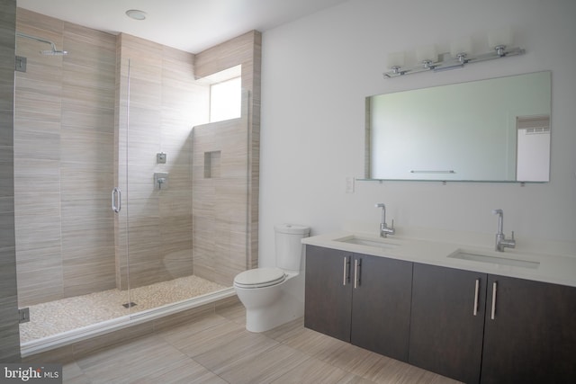 740 S Chris Columbus Blvd Unit 15, Philadelphia, PA 19147 - bathroom with double vanity, a shower stall, and tile patterned floors