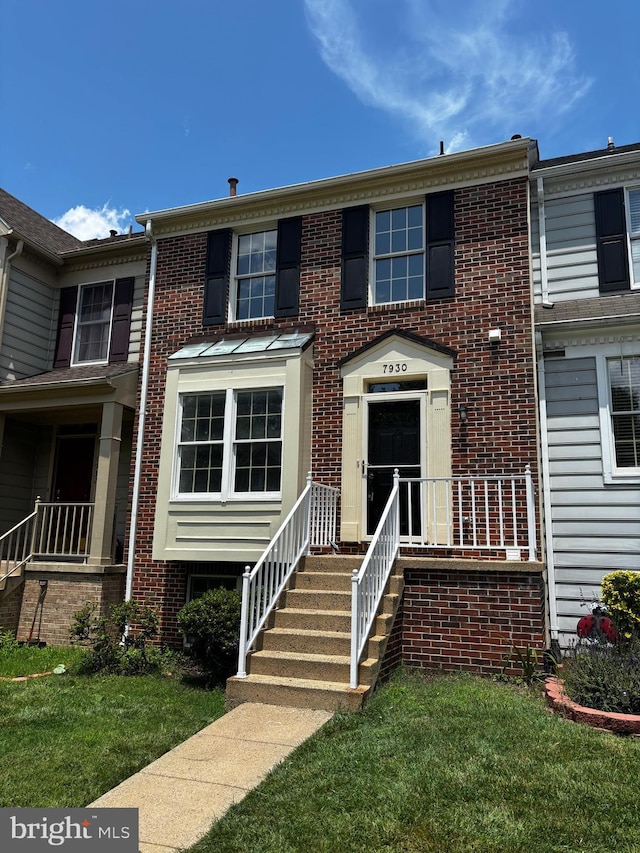 7930 Blue Gray Cir, Manassas, VA 20109 - multi unit property with brick siding and a front lawn