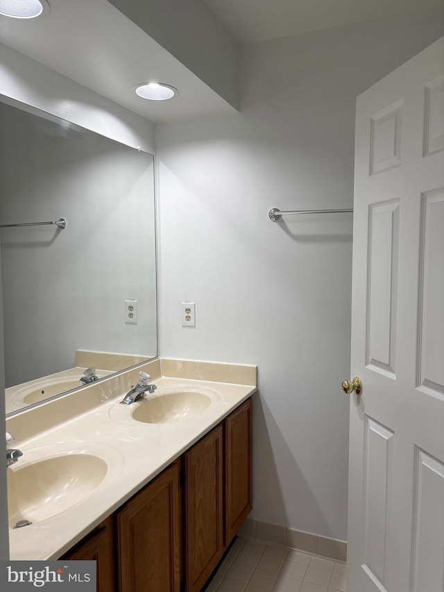 7930 Blue Gray Cir, Manassas, VA 20109 - bathroom with double vanity and tile patterned floors