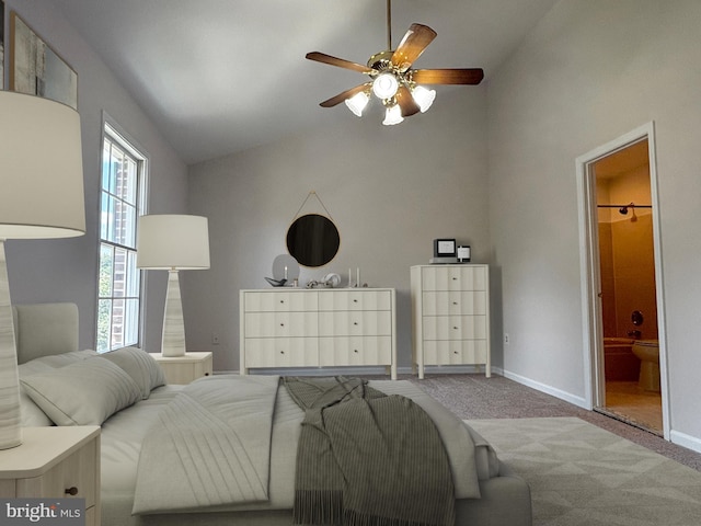 7930 Blue Gray Cir, Manassas, VA 20109 - bedroom featuring carpet flooring, ensuite bath, vaulted ceiling, and ceiling fan