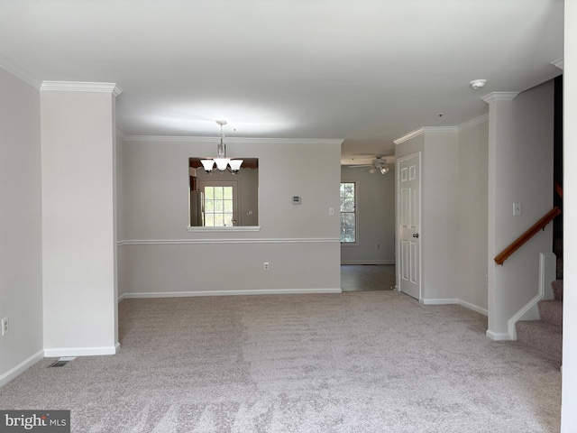7930 Blue Gray Cir, Manassas, VA 20109 - spare room featuring a chandelier, carpet floors, ornamental molding, ceiling fan, and a smoke detector