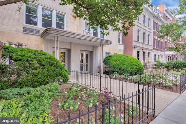 1725 New Hampshire Ave NW Unit 303, Washington, DC 20009 - property entrance featuring brick siding and french doors