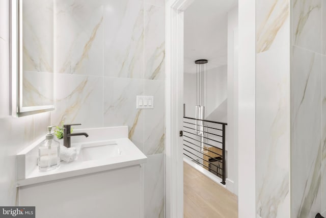 3923 14th St NW Unit 4, Washington, DC 20011 - bathroom with vanity and wood finished floors