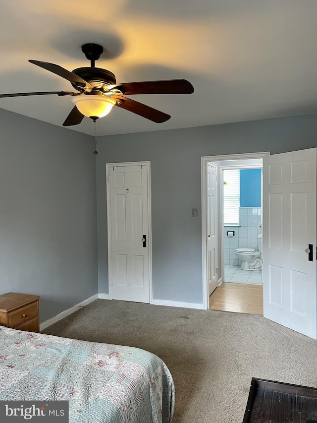 3401 Commonwealth Ave Unit A, Alexandria, VA 22305 - bedroom featuring carpet floors, baseboards, ensuite bath, and a ceiling fan