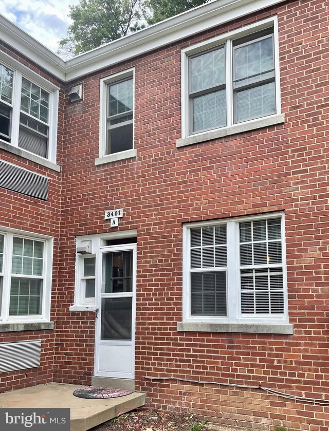 3401 Commonwealth Ave Unit A, Alexandria, VA 22305 - view of exterior entry with brick siding
