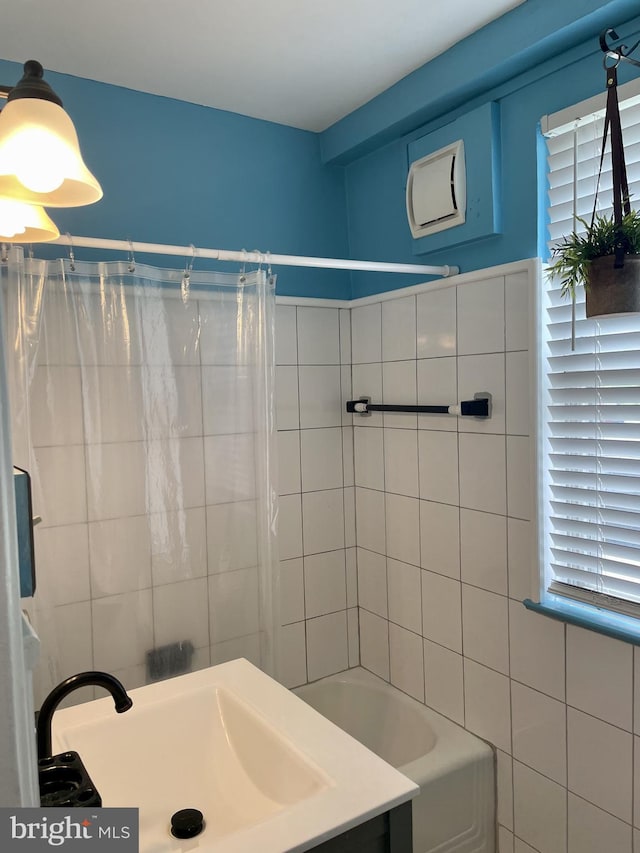 3401 Commonwealth Ave Unit A, Alexandria, VA 22305 - full bathroom featuring tile walls, a tub, vanity, and a shower with shower curtain
