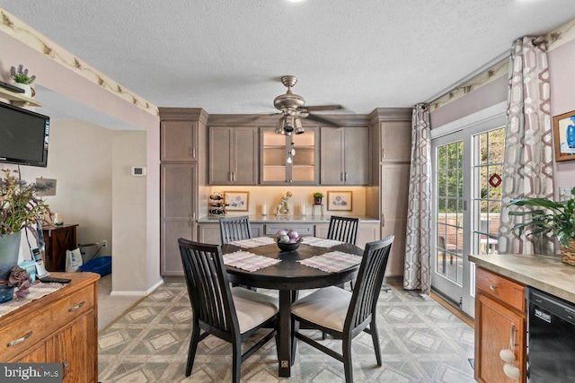 410 Kosoak Rd, Baltimore, MD 21220 - dining space with light floors, a textured ceiling, and a ceiling fan