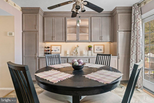 410 Kosoak Rd, Baltimore, MD 21220 - dining area featuring a ceiling fan and baseboards