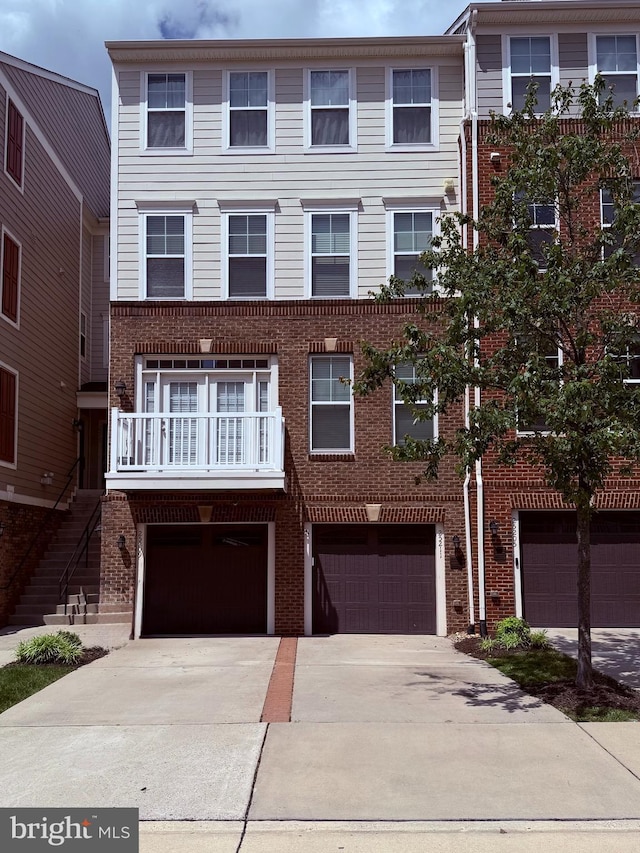 25211 Briargate Ter, Chantilly, VA 20152 - multi unit property featuring brick siding, driveway, and a garage