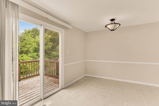 2053 Wintergreen Pl, Rosedale, MD 21237 - entryway with light tile patterned flooring and baseboards