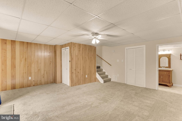 2053 Wintergreen Pl, Rosedale, MD 21237 - finished below grade area with carpet floors, stairway, a drop ceiling, wooden walls, and a sink