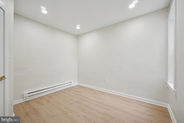46 E Price St, Philadelphia, PA 19144 - spare room featuring a baseboard heating unit, wood finished floors, baseboards, and recessed lighting