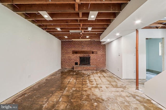 9307 Overlea Dr, Rockville, MD 20850 - finished below grade area with a brick fireplace and brick wall