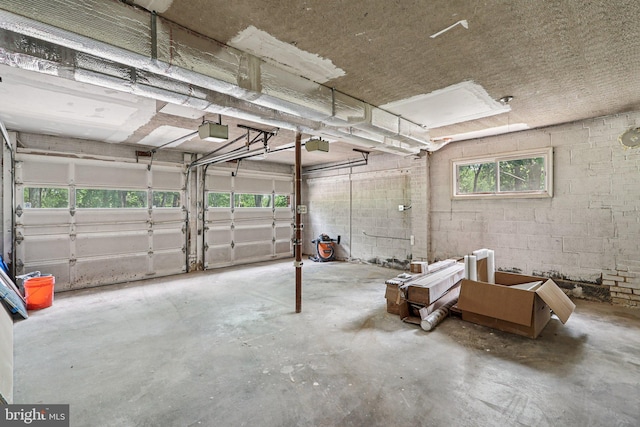 9307 Overlea Dr, Rockville, MD 20850 - garage featuring a garage door opener