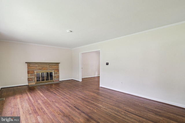 9307 Overlea Dr, Rockville, MD 20850 - unfurnished living room with ornamental molding, baseboards, wood finished floors, and a fireplace